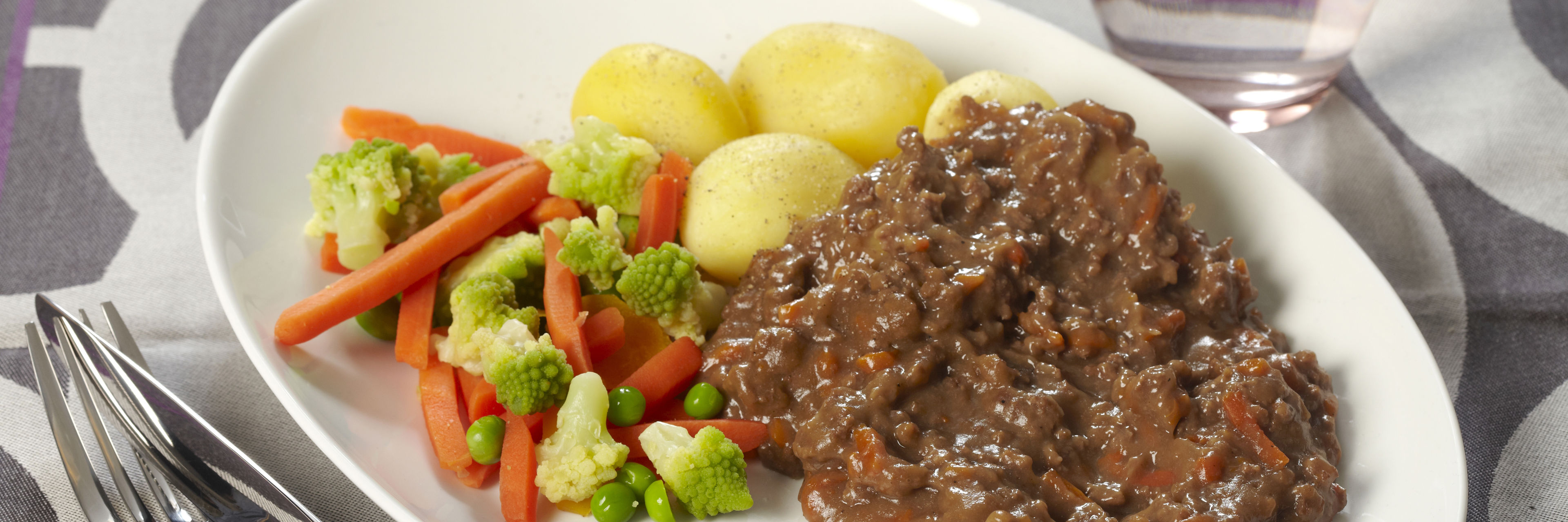 Indianergryde med kartofler og grønt