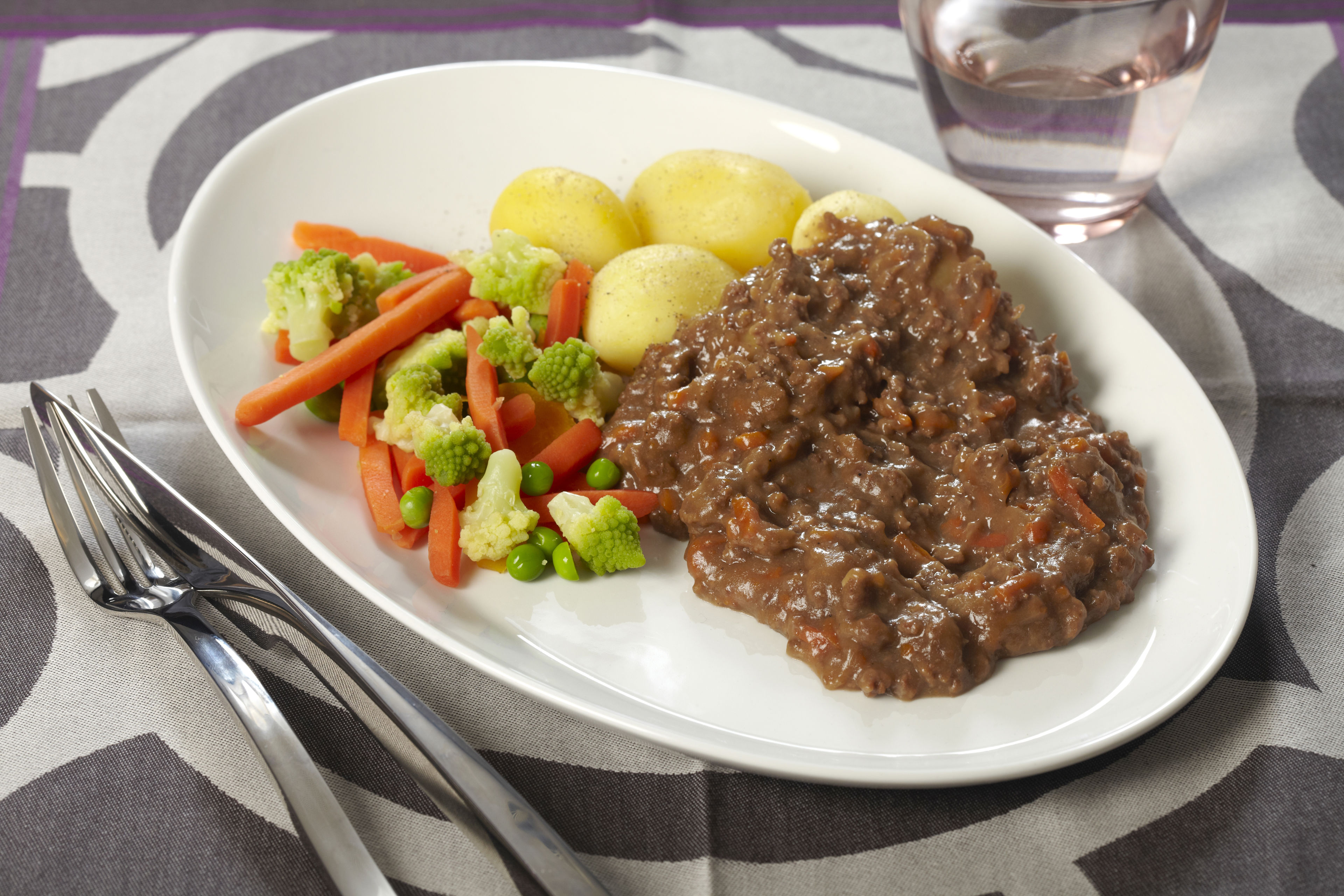 Indianergryde med kartofler og grønt